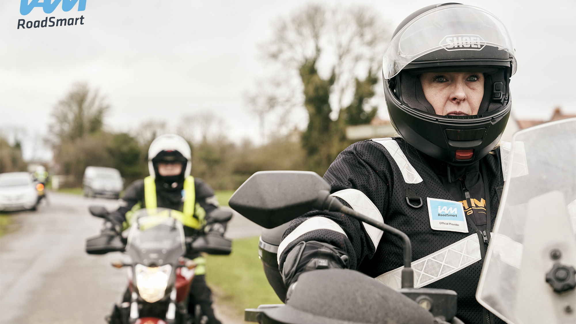 IAM Advanced Riding - Close up of two riders riding out together.